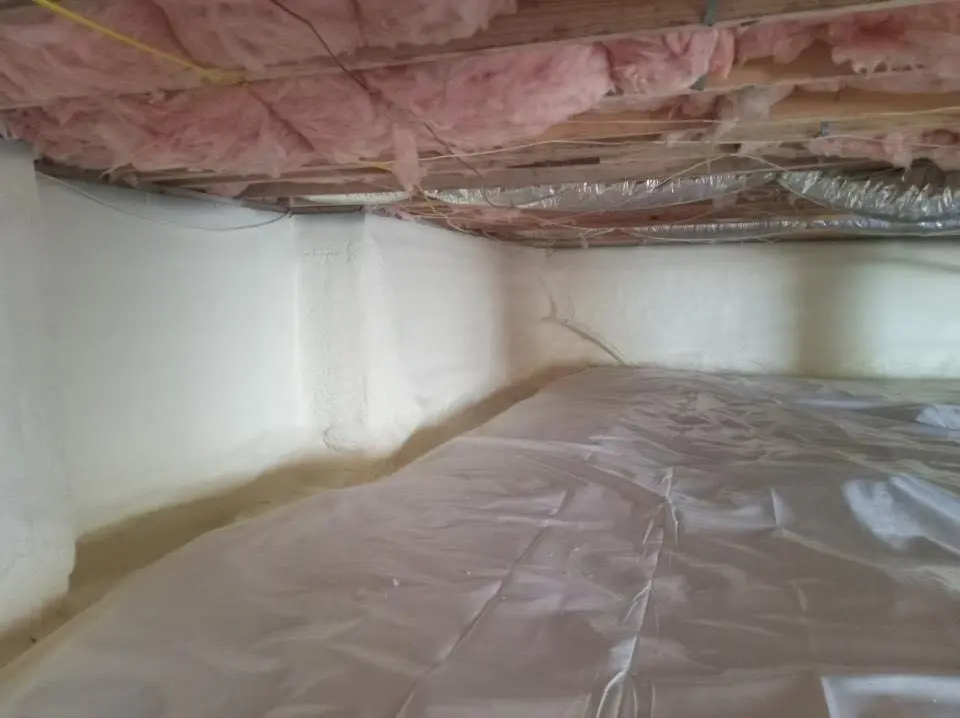 Crawl space encapsulation with closed-cell spray foam for Commercial Roof Restoration in Susanville